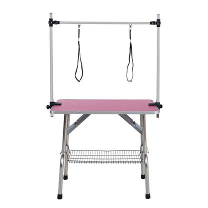 Mesa de aseo plegable para perros y gatos con marco de acero inoxidable y alfombrilla de goma integrada, brazo ajustable y abrazaderas.