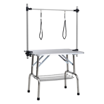 Mesa de aseo plegable para perros y gatos con marco de acero inoxidable y alfombrilla de goma integrada, brazo ajustable y abrazaderas.