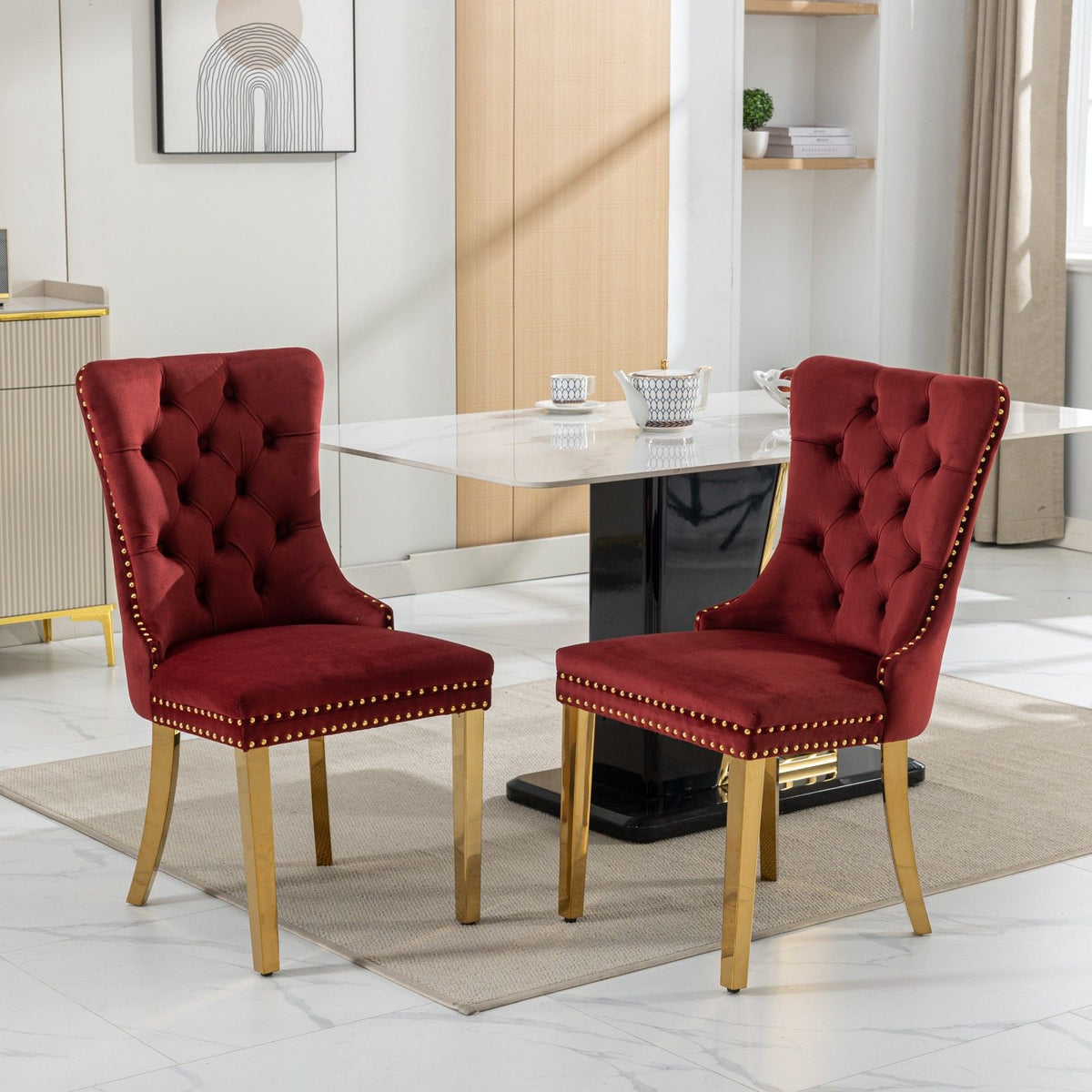 Nikki - Silla de comedor moderna y de alta gama, de madera maciza capitoné, tapizada en terciopelo, con patas de acero inoxidable dorado y ribete de tachuelas (juego de 2)