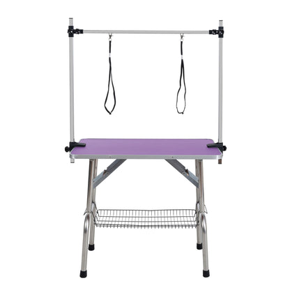 Mesa de aseo plegable para perros y gatos con marco de acero inoxidable y alfombrilla de goma integrada, brazo ajustable y abrazaderas.