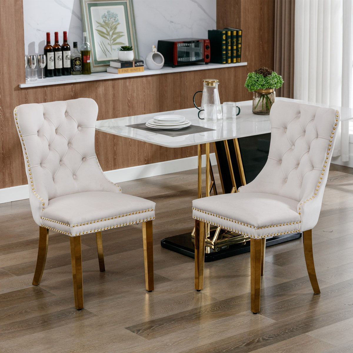 Nikki - Silla de comedor moderna y de alta gama, de madera maciza capitoné, tapizada en terciopelo, con patas de acero inoxidable dorado y ribete de tachuelas (juego de 2)